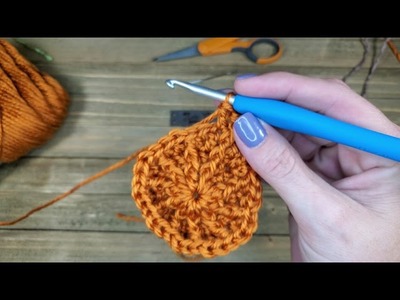 Crocheted baby size pumpkin beanie